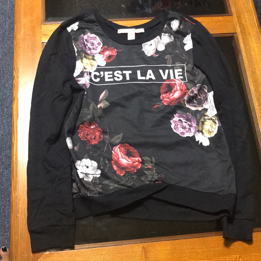 Sweater that says “C’EST LA VIE” with roses